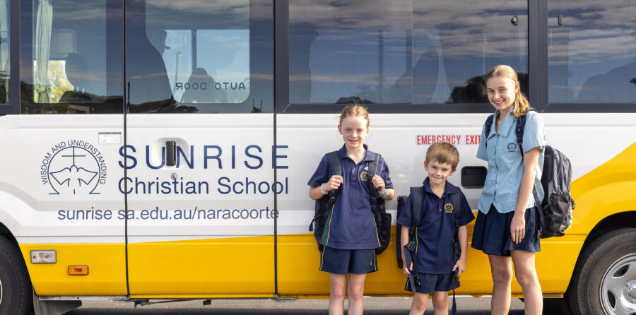Students standing near bus