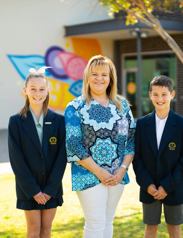 Cindy and students outdoors
