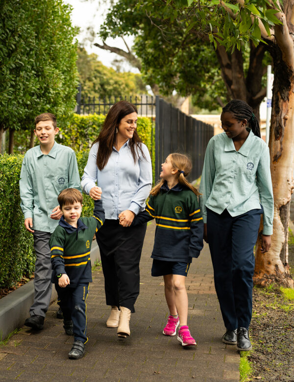 Principal and student walk to Sunrise Fullarton